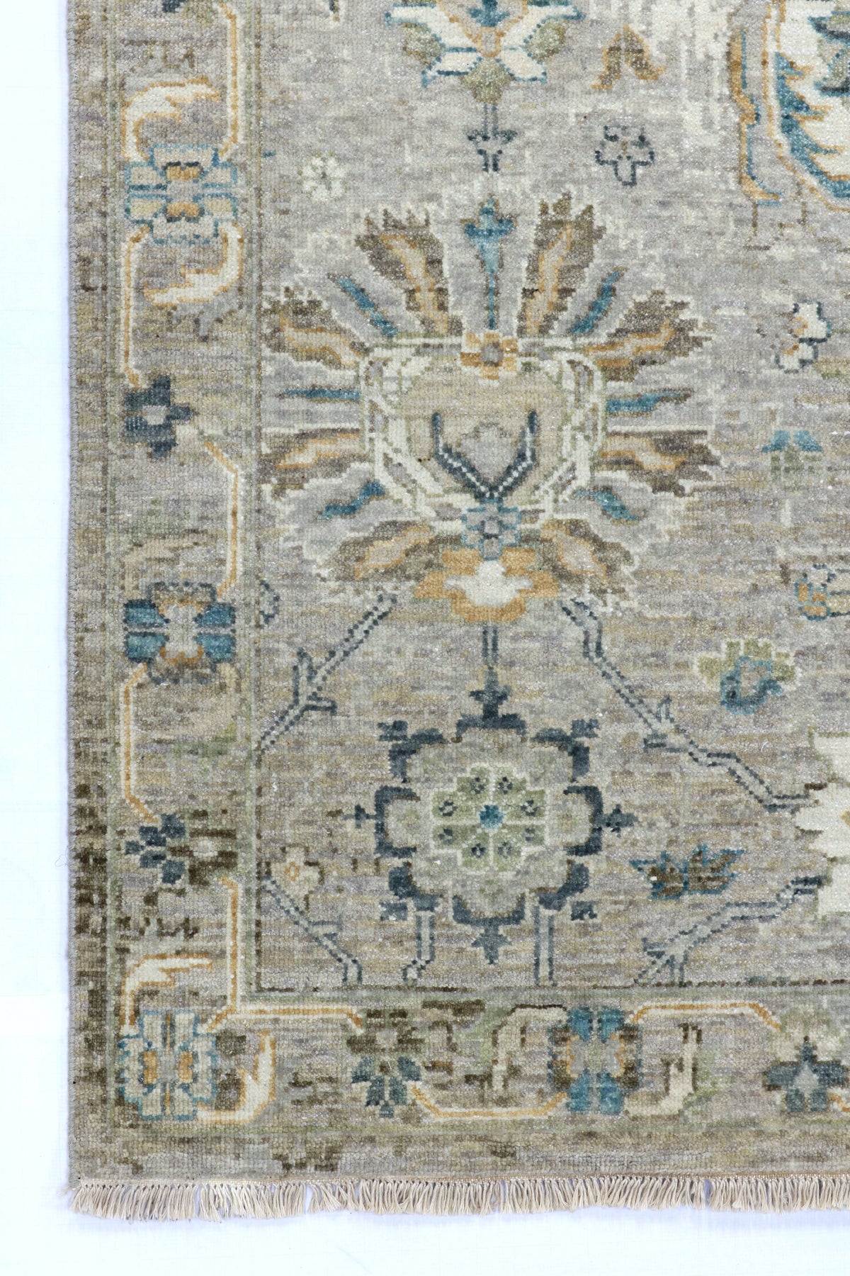 Decorative rug with intricate patterns on a white background