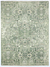 Green and beige patterned rug on a plain background