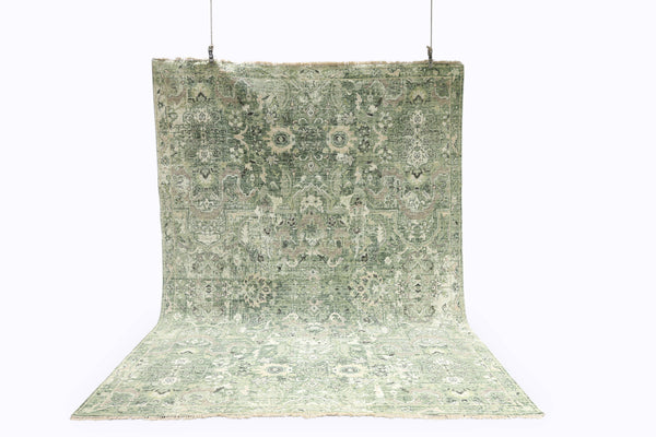 Green patterned rug on a white background