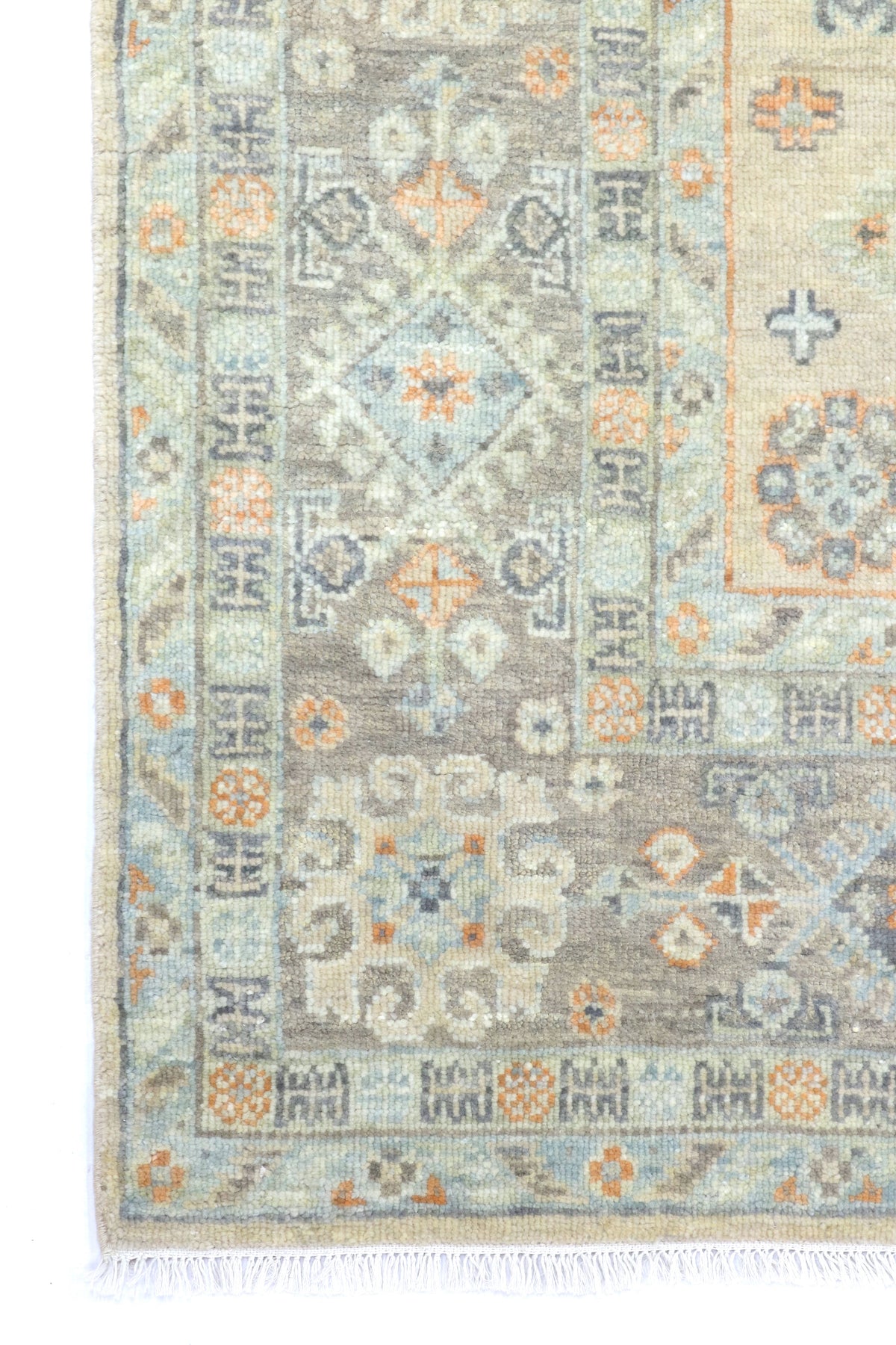 Decorative rug with geometric pattern on a white background