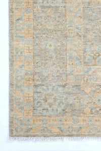 Patterned rug with a geometric design on a white background